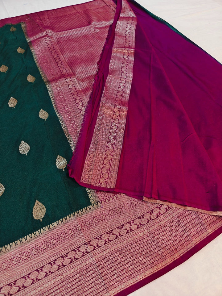 BOTTLE GREEN KHADDI GEORGETTE WITH VINE BORDER