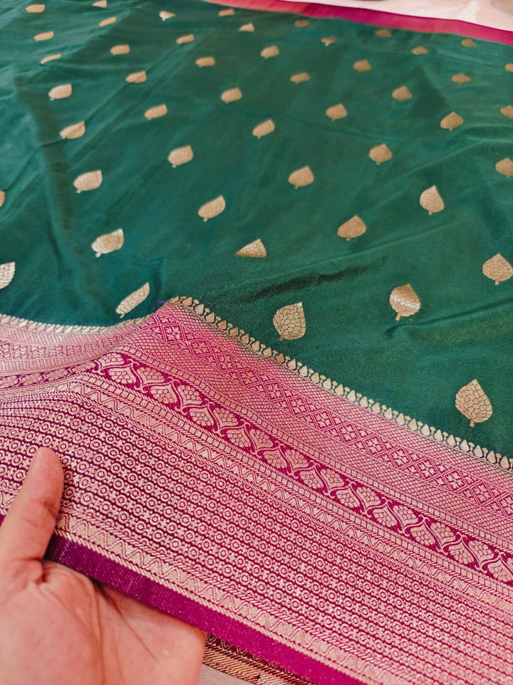 BOTTLE GREEN KHADDI GEORGETTE WITH VINE BORDER