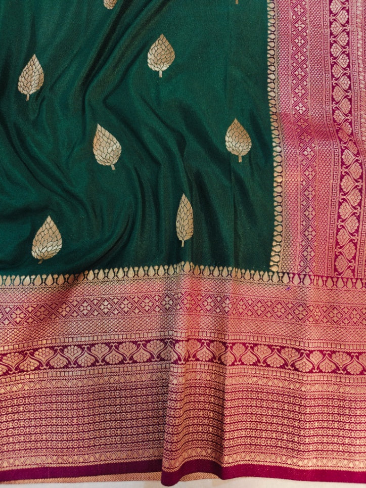 BOTTLE GREEN KHADDI GEORGETTE WITH VINE BORDER