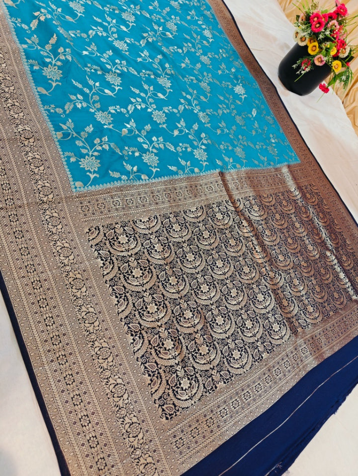 PEARL BLUE SAREE WITH NAVY BLUE KHADDI GEORGETTE