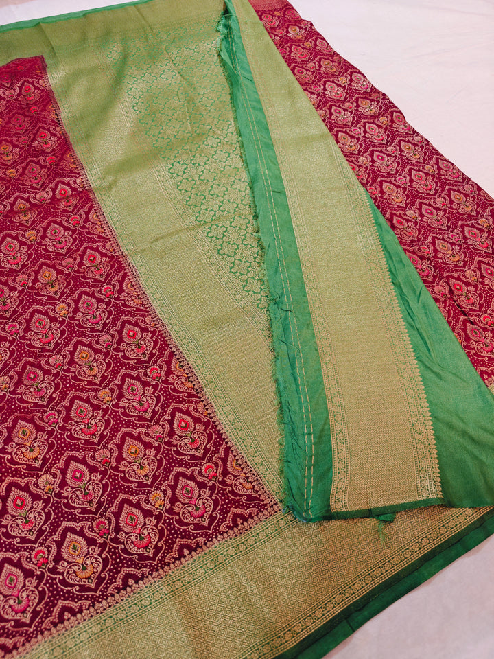 KHADDI GEORGETTE IN GARNET MULTICOLOUR DESIGN WITH PARROT GREEN BORDER