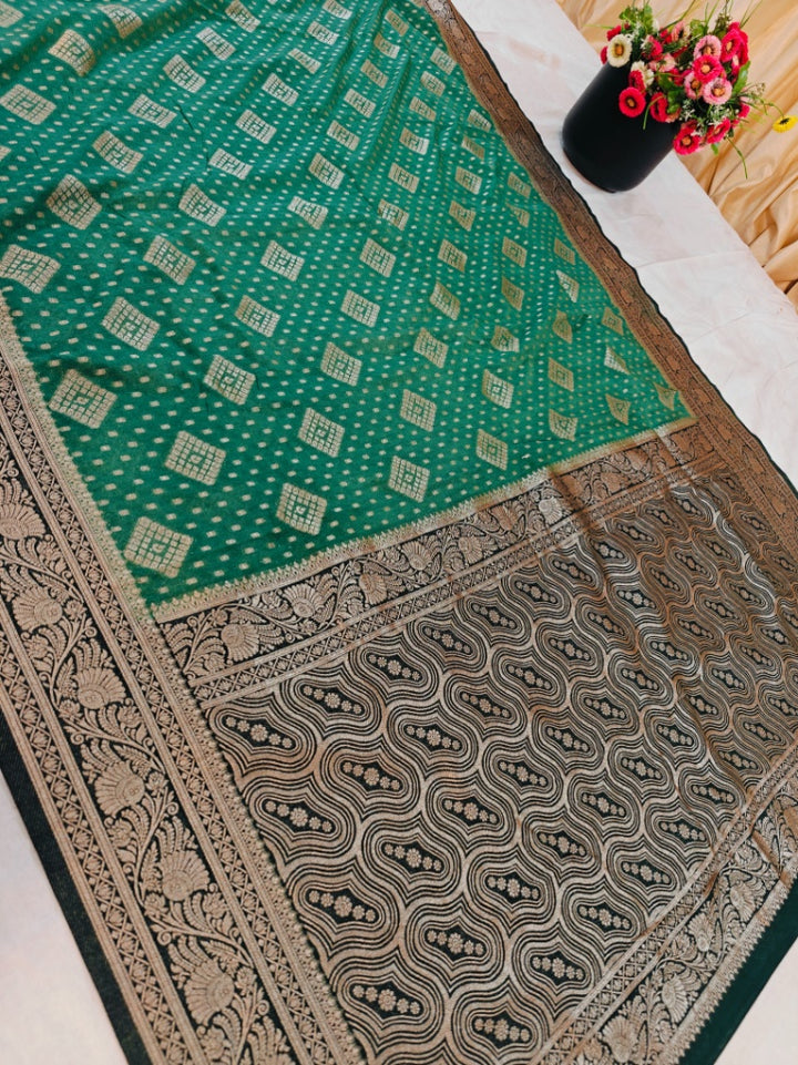 BASIL GREEN KHADDI GEORGETTE WITH BOTTLE GREEN BORDER
