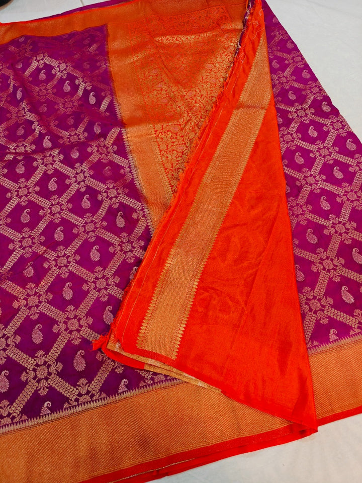 MAGENTA KHADDI GEORGETTE WITH ORANGE BORDER