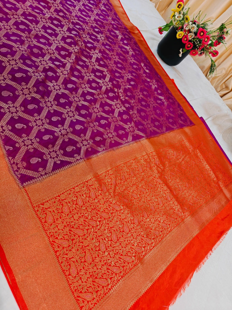 MAGENTA KHADDI GEORGETTE WITH ORANGE BORDER