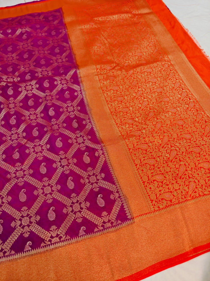 MAGENTA KHADDI GEORGETTE WITH ORANGE BORDER