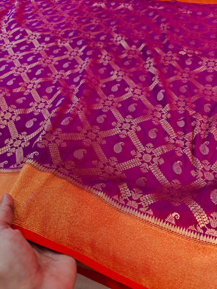 MAGENTA KHADDI GEORGETTE WITH ORANGE BORDER