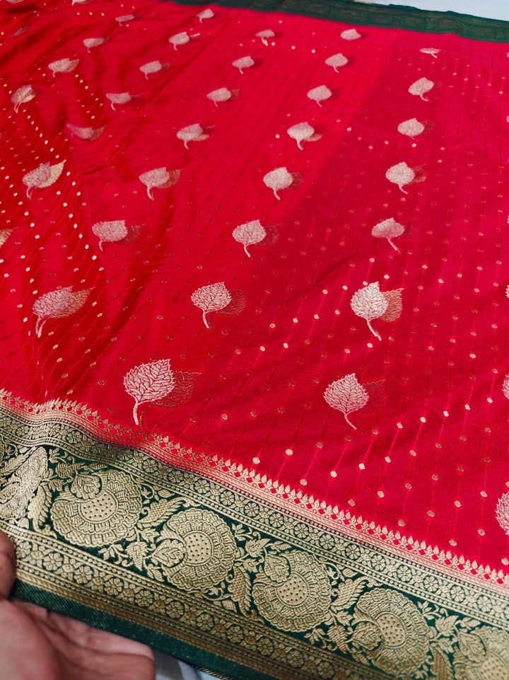 RED COLOUR KHADDI GEORGETTE WITH BOTTLE GREEN BORDER