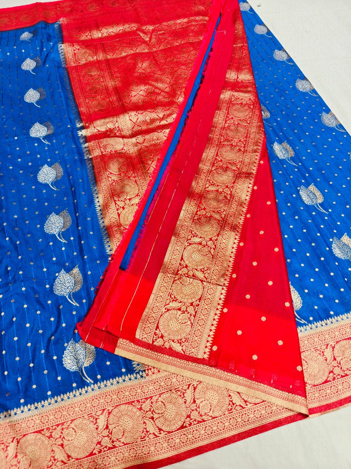 ROYAL BLUE KHADDI GEORGETTE WITH RED BORDER