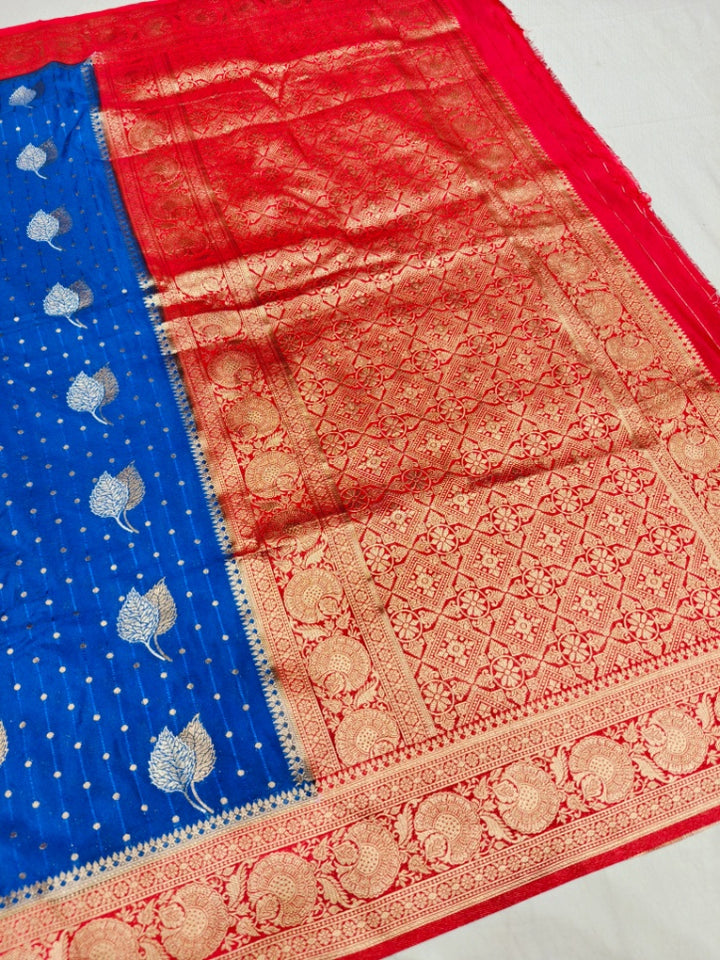 ROYAL BLUE KHADDI GEORGETTE WITH RED BORDER