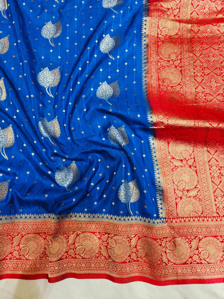 ROYAL BLUE KHADDI GEORGETTE WITH RED BORDER