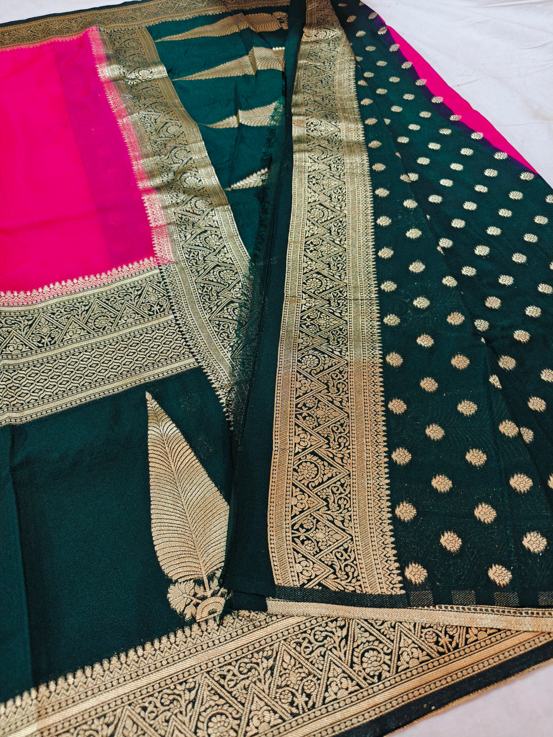 VIBRANT PINK KHADDI GEORGETTE WITH KAIRI BOOTA ON BLACK BORDER