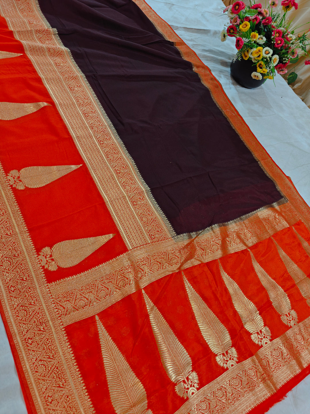 DARK BROWN KHADDI GEORGETTE WITH KAIRI BOOTA ON VIBRANT RED