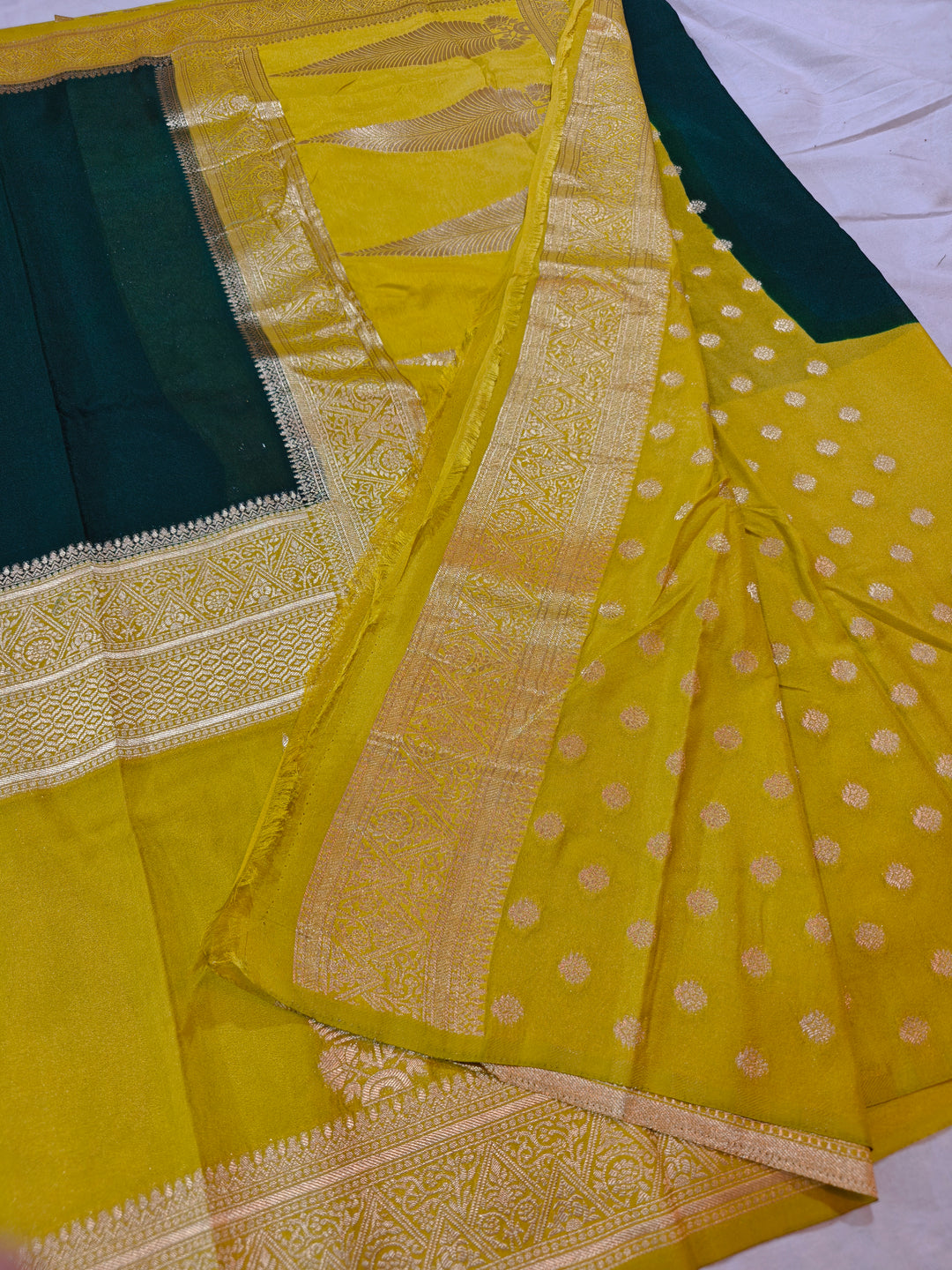 BOTTLE GREEN KHADDI GEORGETTE WITH KAIRI BOOTA ON GOLD BORDER