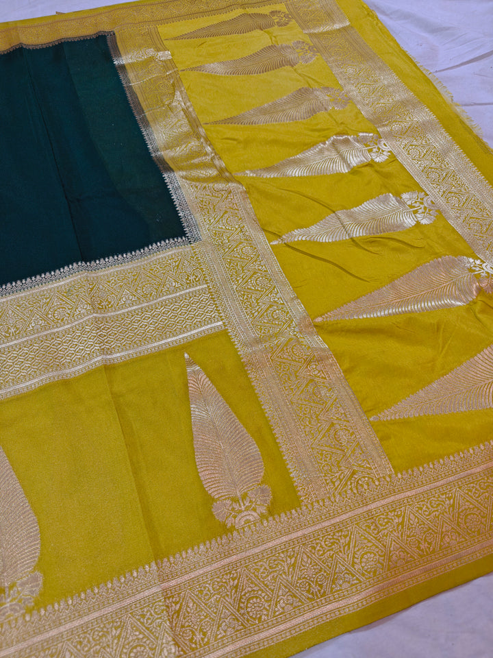 BOTTLE GREEN KHADDI GEORGETTE WITH KAIRI BOOTA ON GOLD BORDER