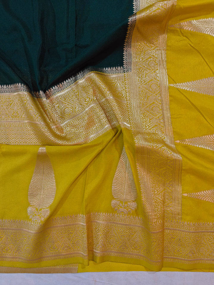 BOTTLE GREEN KHADDI GEORGETTE WITH KAIRI BOOTA ON GOLD BORDER