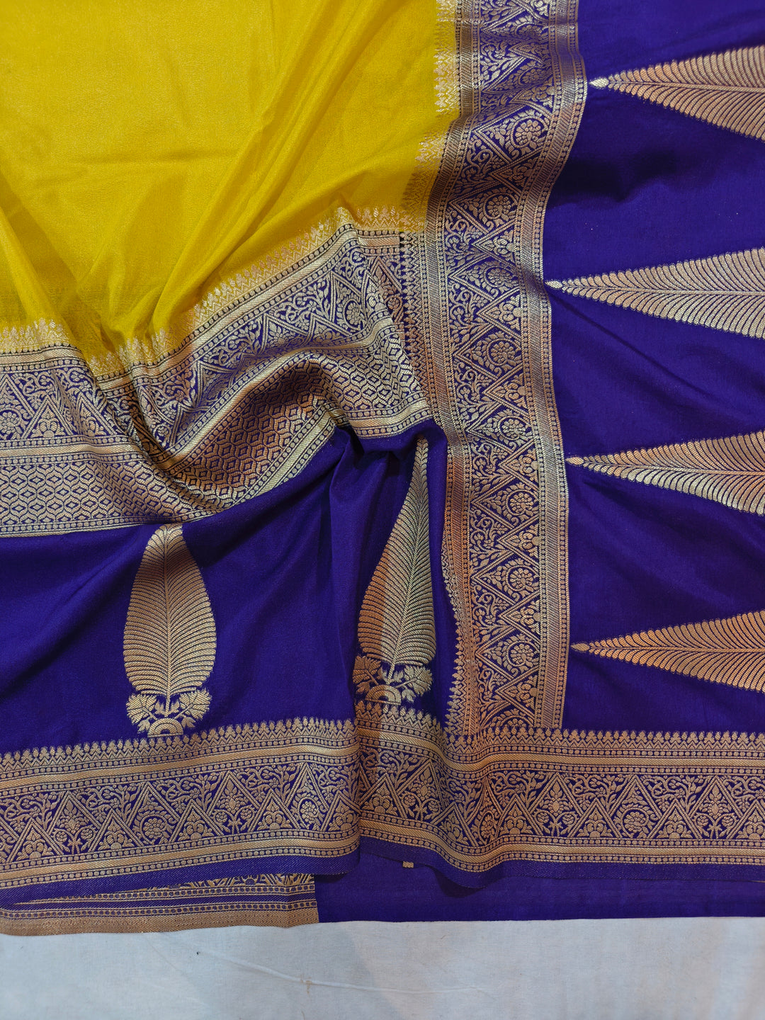 GOLD KHADDI GEORGETTE WITH KAIRI BOOTA ON MAGENTA BORDER