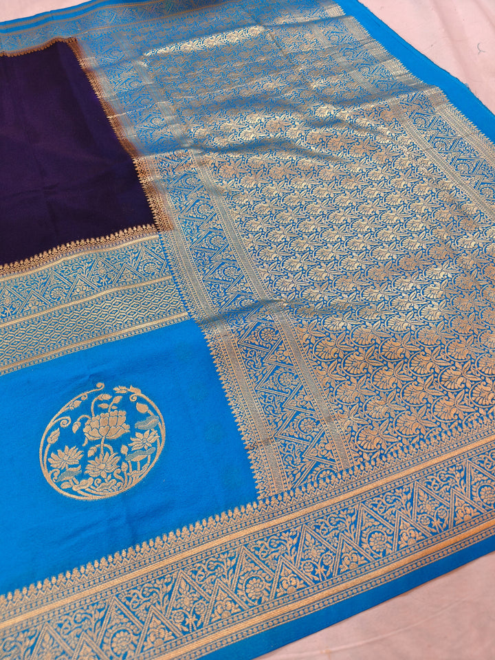 NAVY BLUE GHADDI GEORGETTE WITH SKY BLUE BORDER