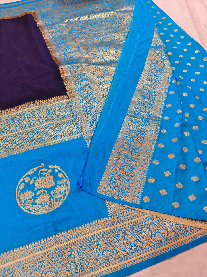 NAVY BLUE GHADDI GEORGETTE WITH SKY BLUE BORDER