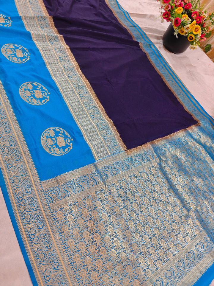 NAVY BLUE GHADDI GEORGETTE WITH SKY BLUE BORDER