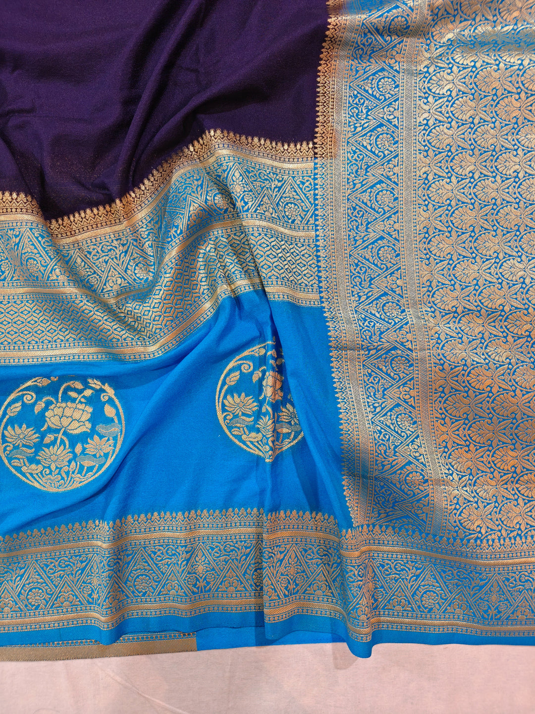 NAVY BLUE GHADDI GEORGETTE WITH SKY BLUE BORDER