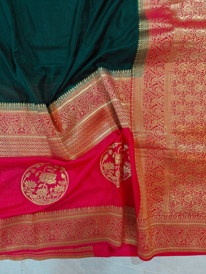 BOTTLE GREEN KHADDI GEORGETTE WITH RED BORDER