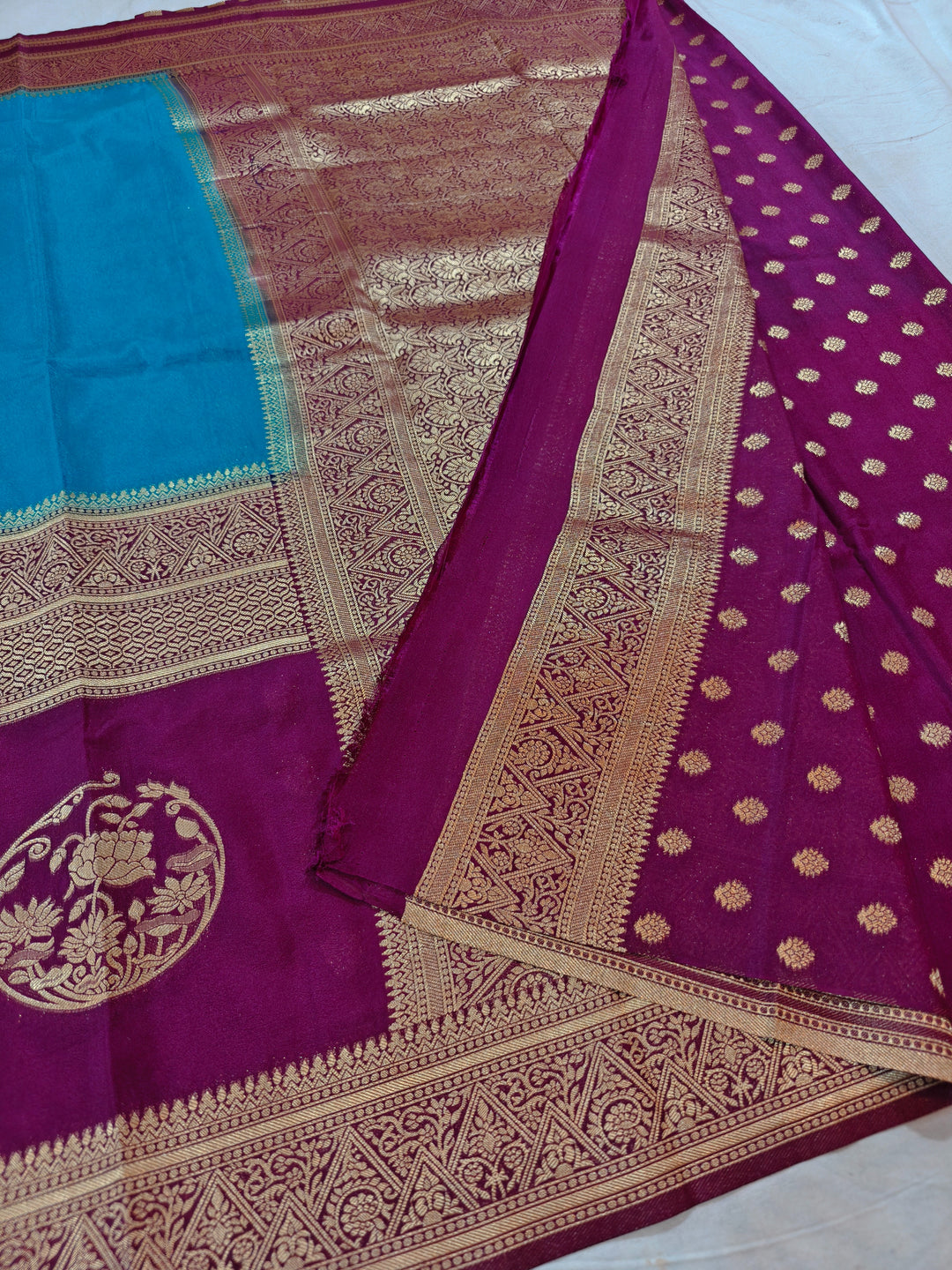 SKY BLUE KHADDI GEORGETTE WITH VINE BORDER