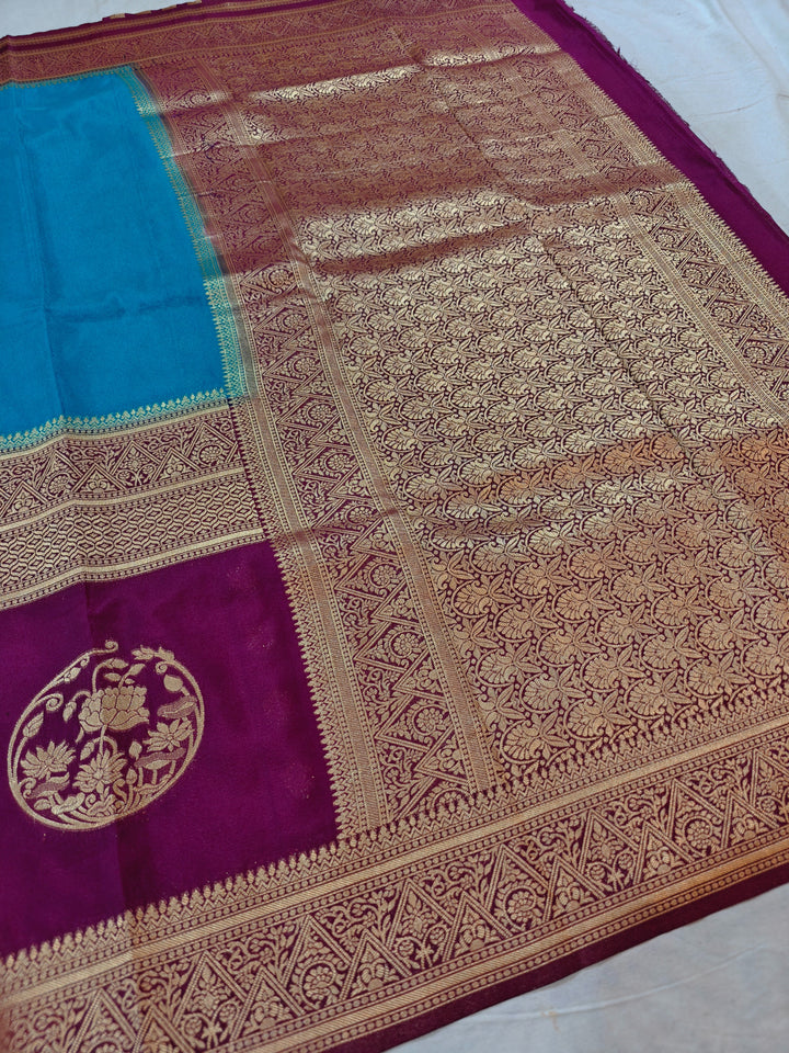 SKY BLUE KHADDI GEORGETTE WITH VINE BORDER