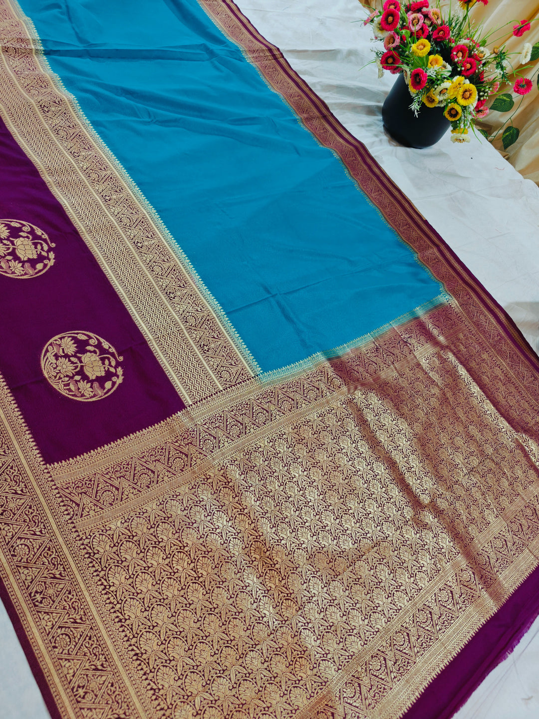 SKY BLUE KHADDI GEORGETTE WITH VINE BORDER