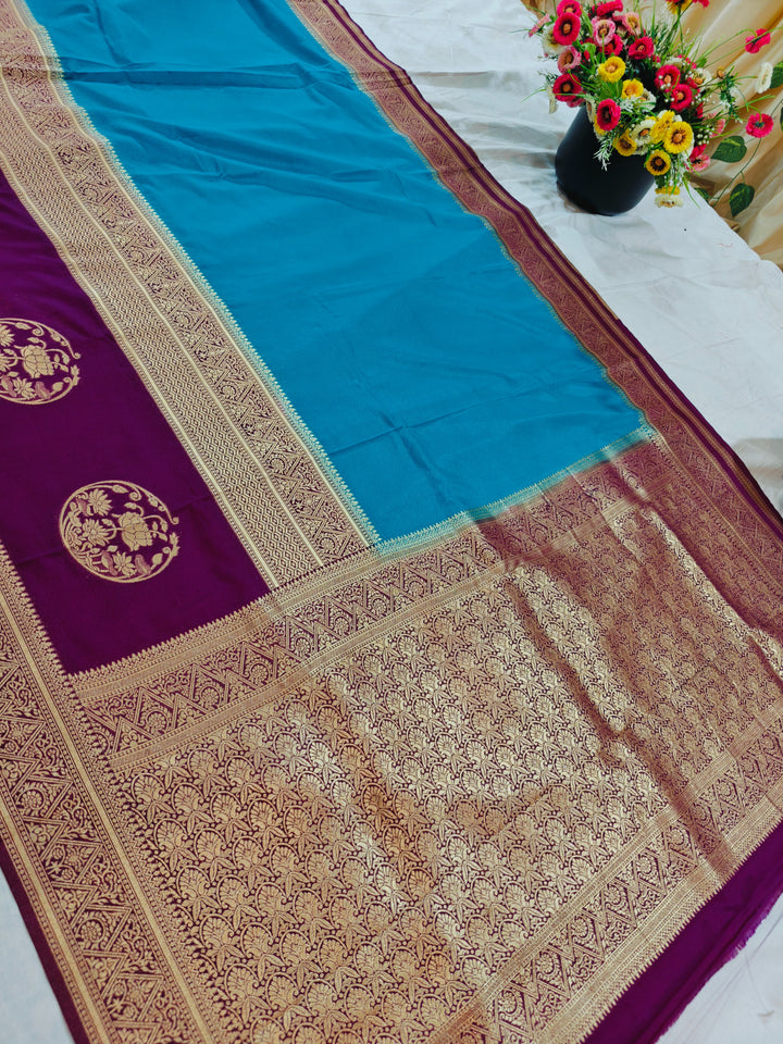 SKY BLUE KHADDI GEORGETTE WITH VINE BORDER
