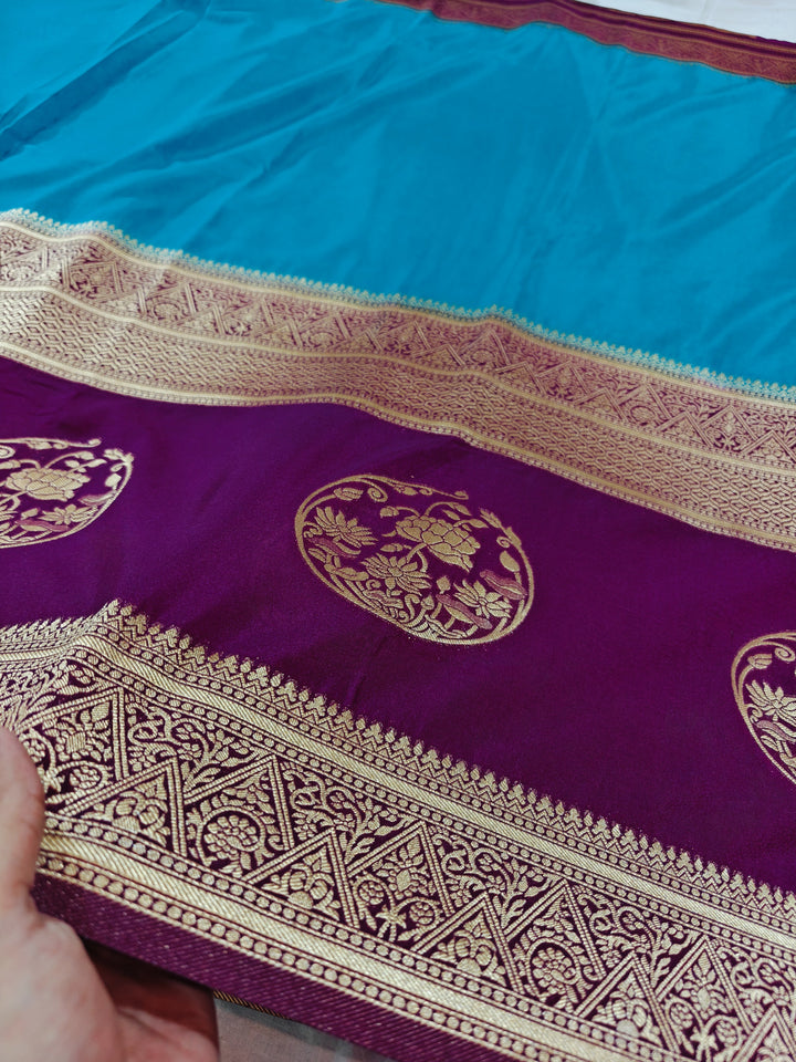 SKY BLUE KHADDI GEORGETTE WITH VINE BORDER