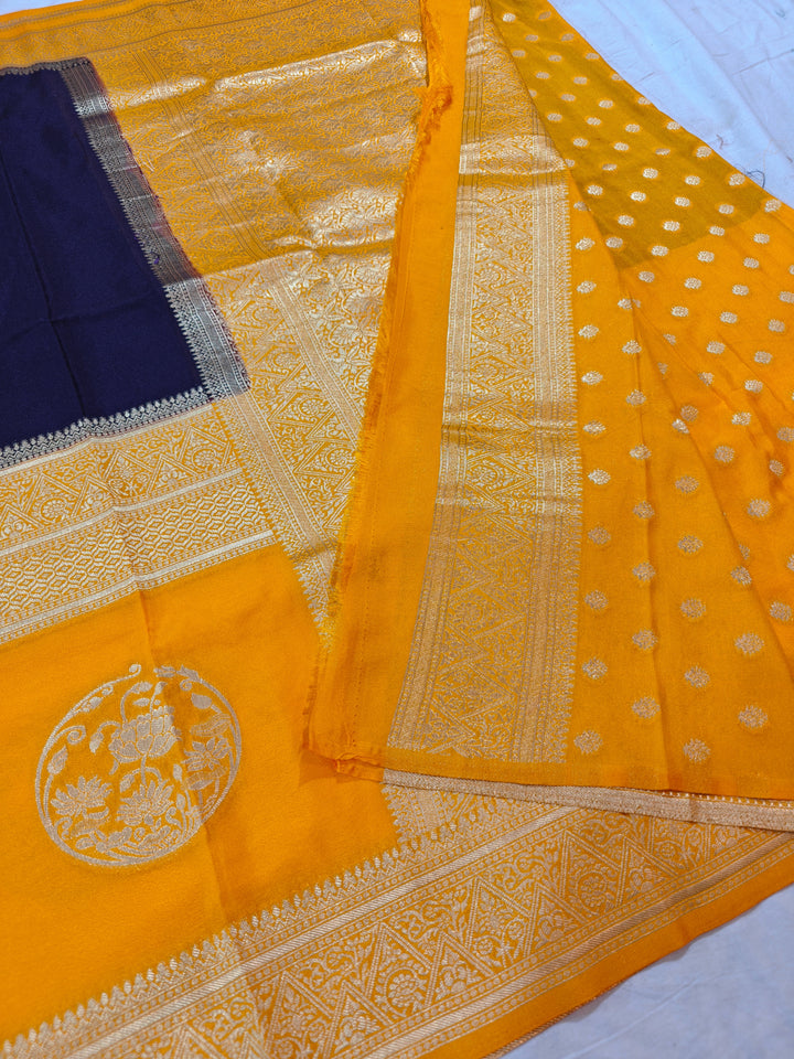 NAVY BLUE KHADDI GEORGETTE WITH GOLD BORDER