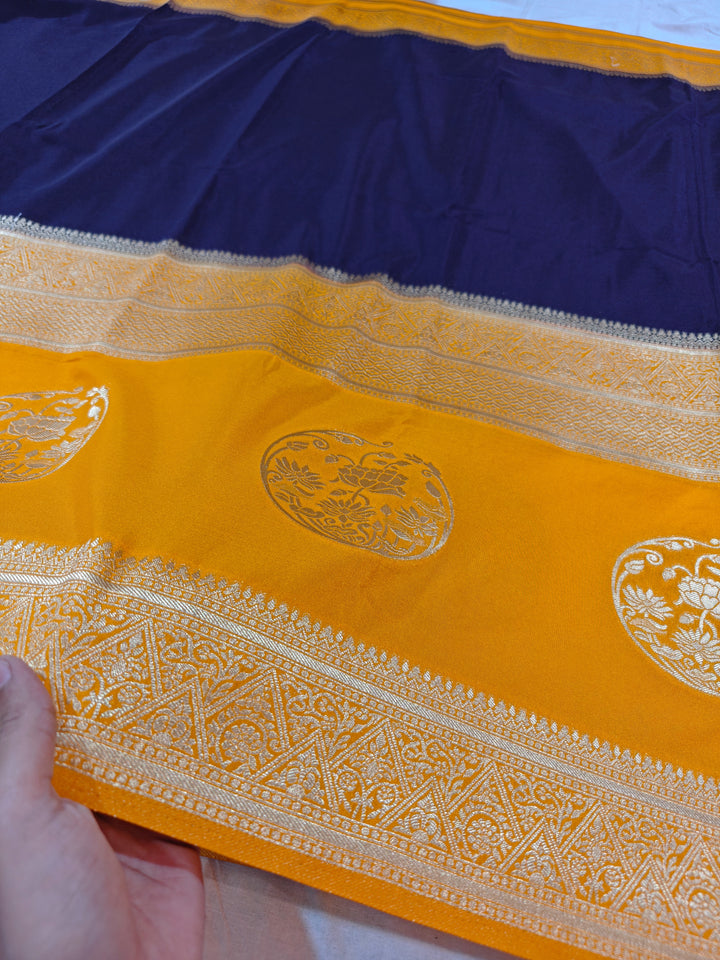 NAVY BLUE KHADDI GEORGETTE WITH GOLD BORDER