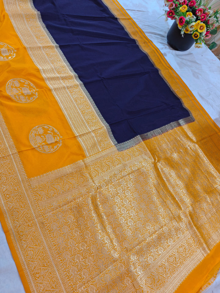 NAVY BLUE KHADDI GEORGETTE WITH GOLD BORDER