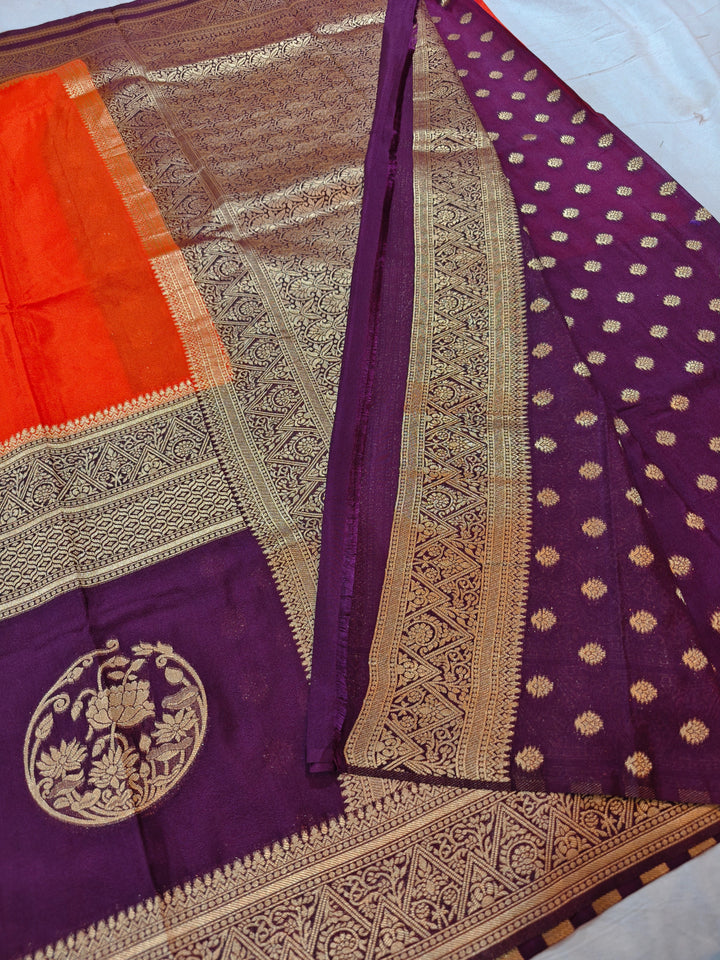 TANGY ORANGE KHADDI GEORGETTE WITH INDIGO BORDER