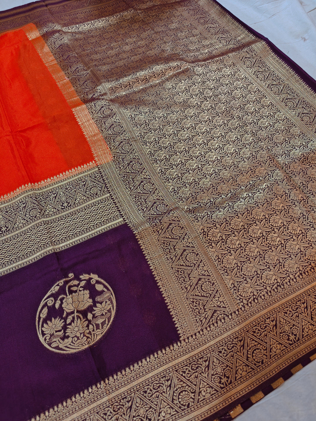 TANGY ORANGE KHADDI GEORGETTE WITH INDIGO BORDER