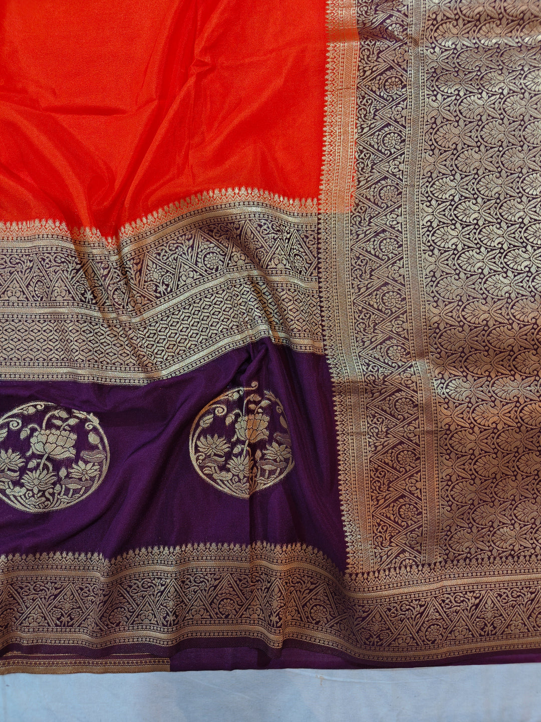 TANGY ORANGE KHADDI GEORGETTE WITH INDIGO BORDER