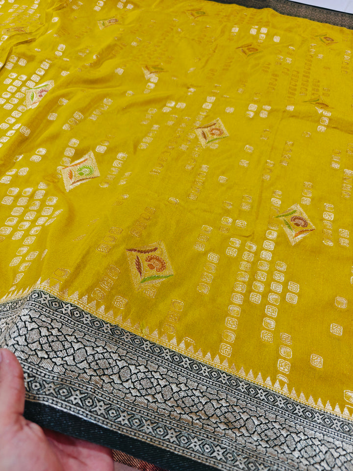YELLOW KHADDI GEORGETTE WITH BOTTLE GREEN BORDER