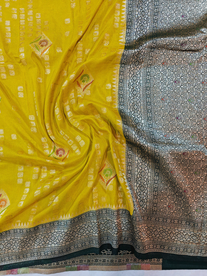 YELLOW KHADDI GEORGETTE WITH BOTTLE GREEN BORDER