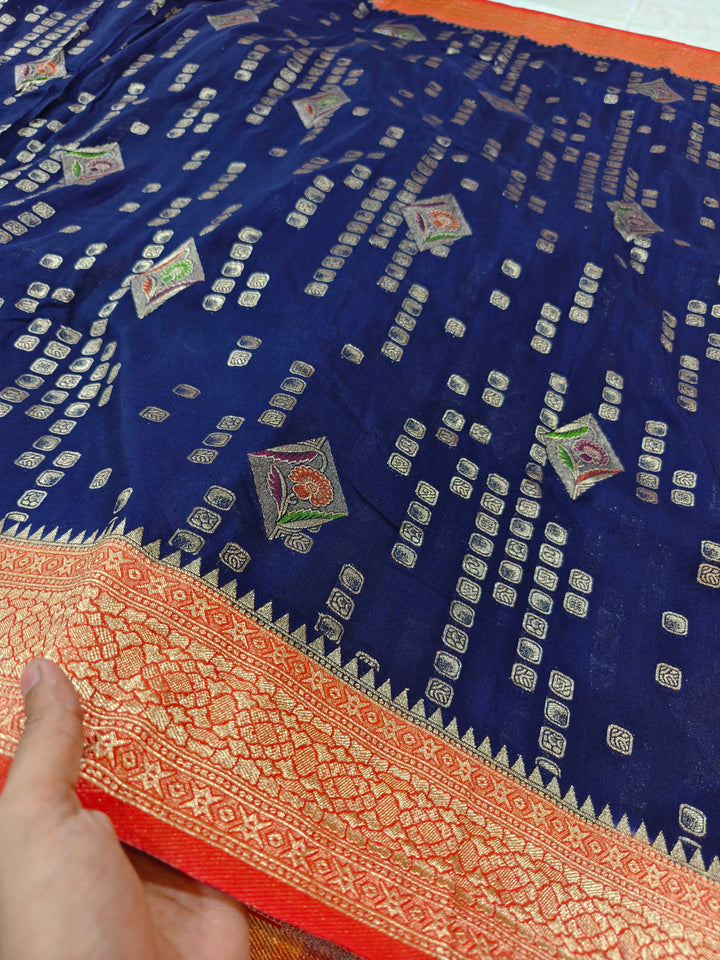 NAVY BLUE KHADDI GEORGETTE WITH RED BORDER