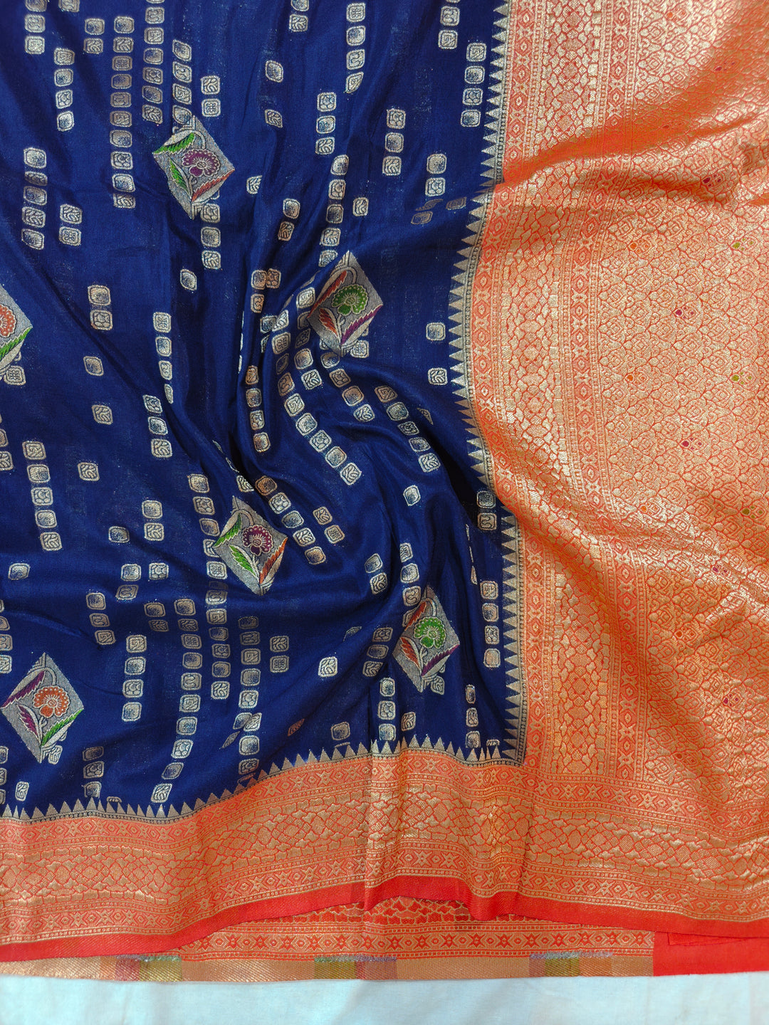 NAVY BLUE KHADDI GEORGETTE WITH RED BORDER