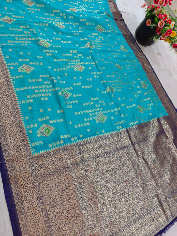 ICE BLUE KHADDI GEORGETTE WITH NAVY BLUE BORDER