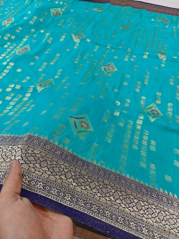 ICE BLUE KHADDI GEORGETTE WITH NAVY BLUE BORDER