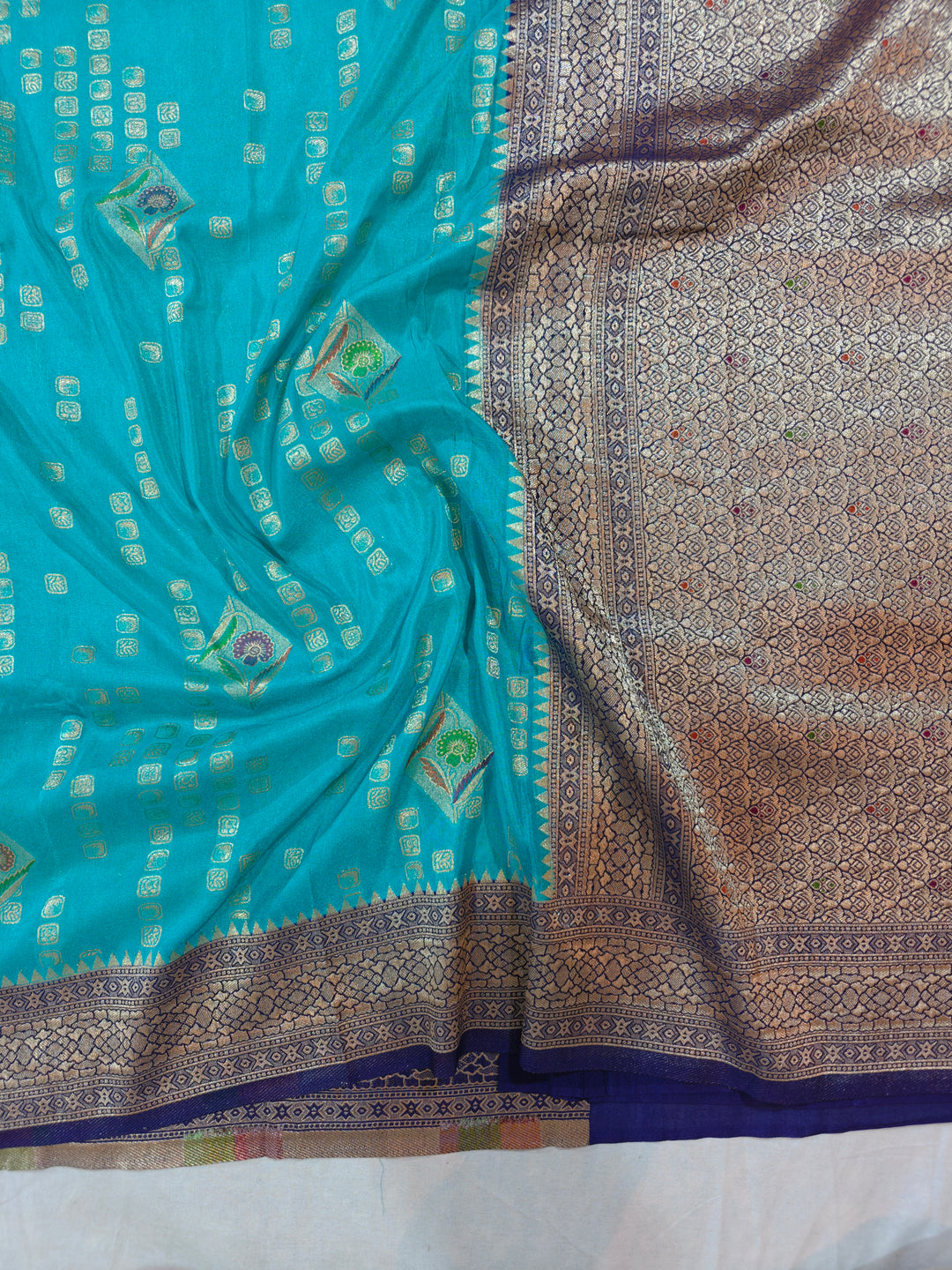 ICE BLUE KHADDI GEORGETTE WITH NAVY BLUE BORDER