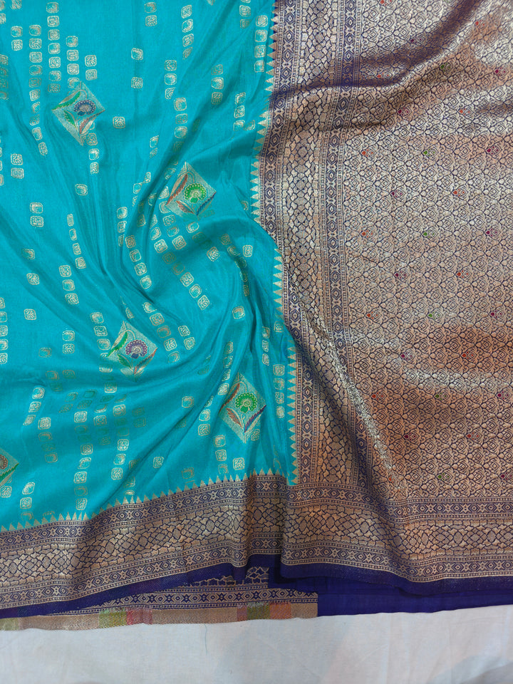 ICE BLUE KHADDI GEORGETTE WITH NAVY BLUE BORDER