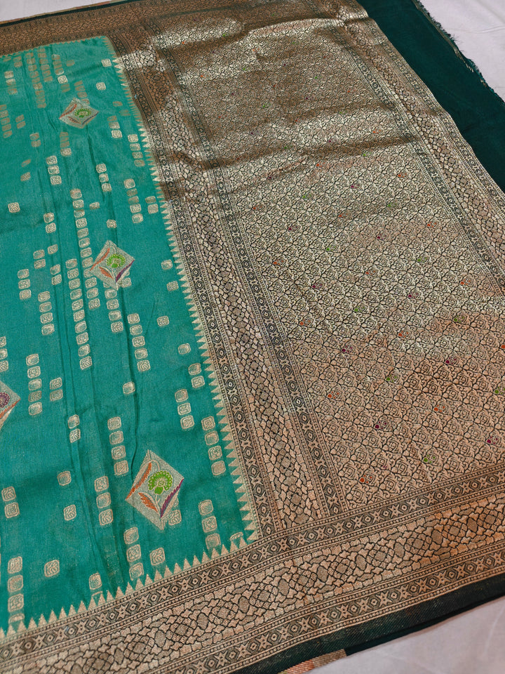 SEA GREEN KHADDI GEORGETTE WITH BOTTLE GREEN BORDER