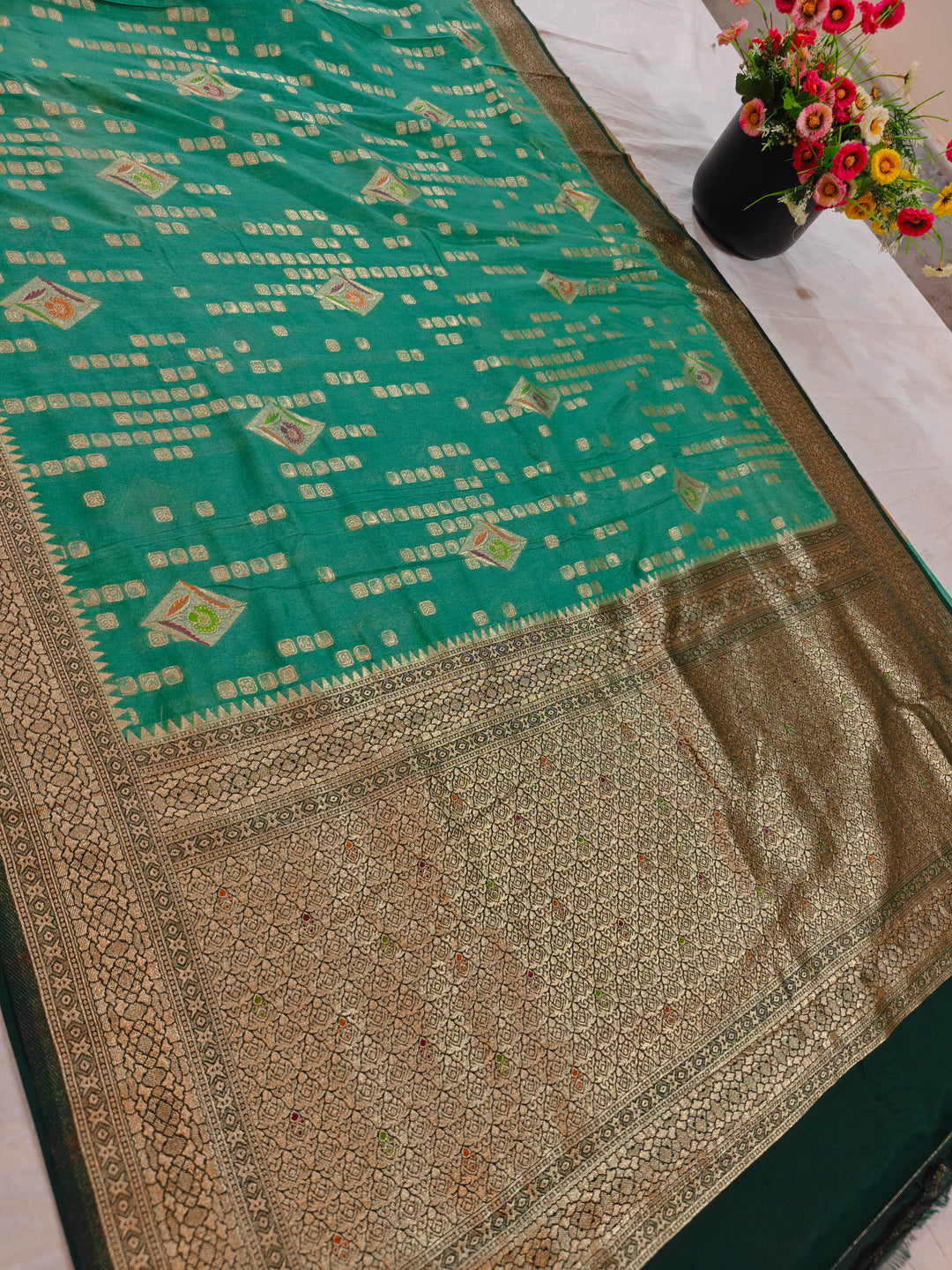 SEA GREEN KHADDI GEORGETTE WITH BOTTLE GREEN BORDER