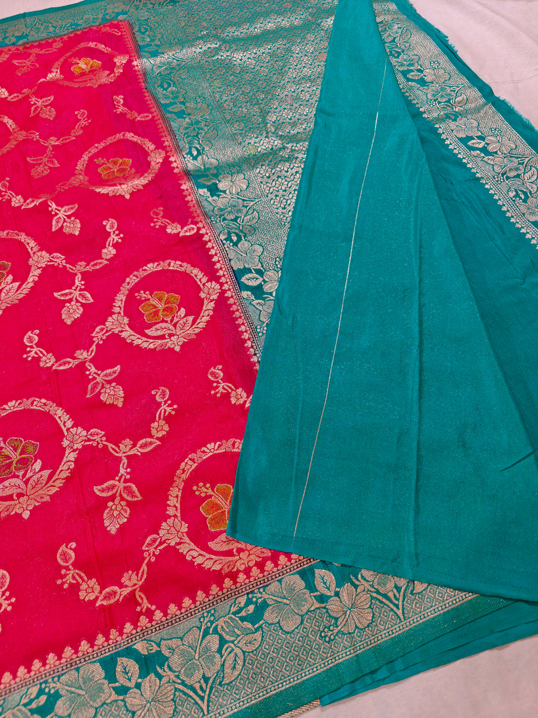 KHADDI GEORGETTE IN CHERRY RED WITH SEA GREEN BORDER