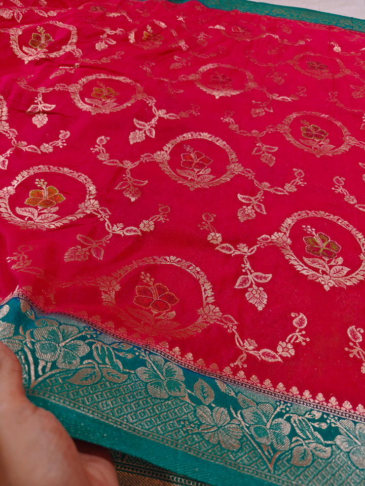 KHADDI GEORGETTE IN CHERRY RED WITH SEA GREEN BORDER