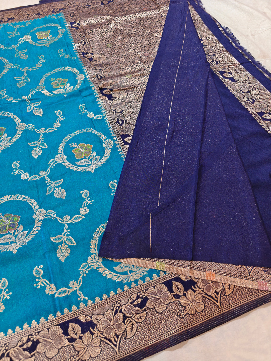 KHADDI GEORGETTE IN OCEAN BLUE WITH NAVY BLUE BORDER