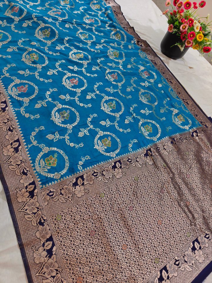 KHADDI GEORGETTE IN OCEAN BLUE WITH NAVY BLUE BORDER